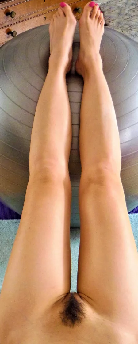 My Asian wife making sure she keeps her tummy flat and her thigh gap perfect with some naked exercise ball stretches by Voyeursharer