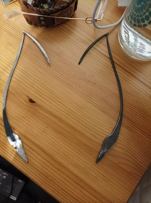 My boyfriend knows I'm a furry. So he brought me these ear shaped-like iron thingies from work (he's a blacksmith) 🥺♥️ by LexPendragoon