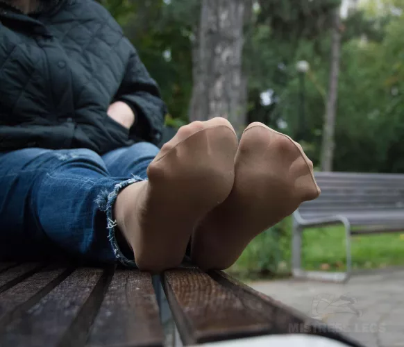 My cute sweaty nylon soles outdoor on the bench at a rainy day by MistressLegs