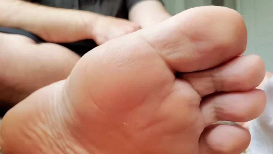 my hot, bare foot after a workout by Sckb4u