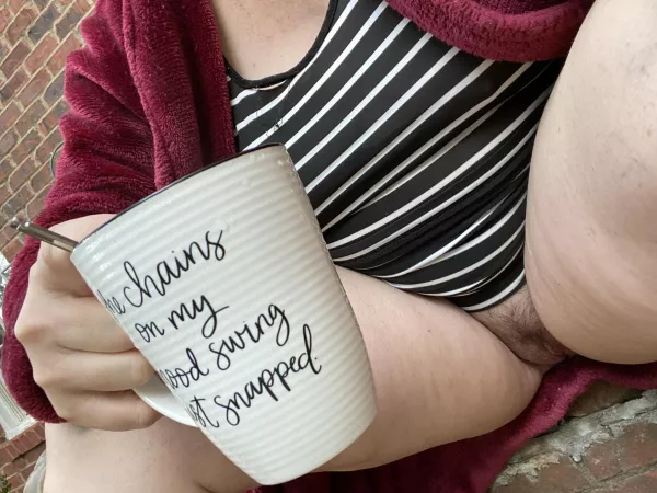 My kitty is enjoying risky open air coffee on her front porch! by icthus_medicus