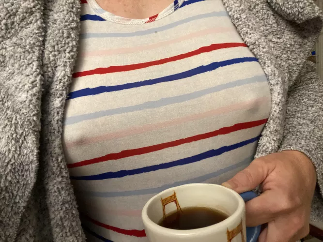 My kitty sees how chilly it is before drinking her Sanka. by icthus_medicus