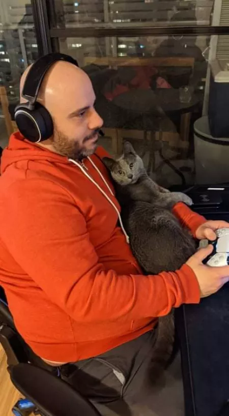 My little gaming buddy. He patiently sits with me while I game and I reward him with scratches between rounds and during cutscenes. by mat541