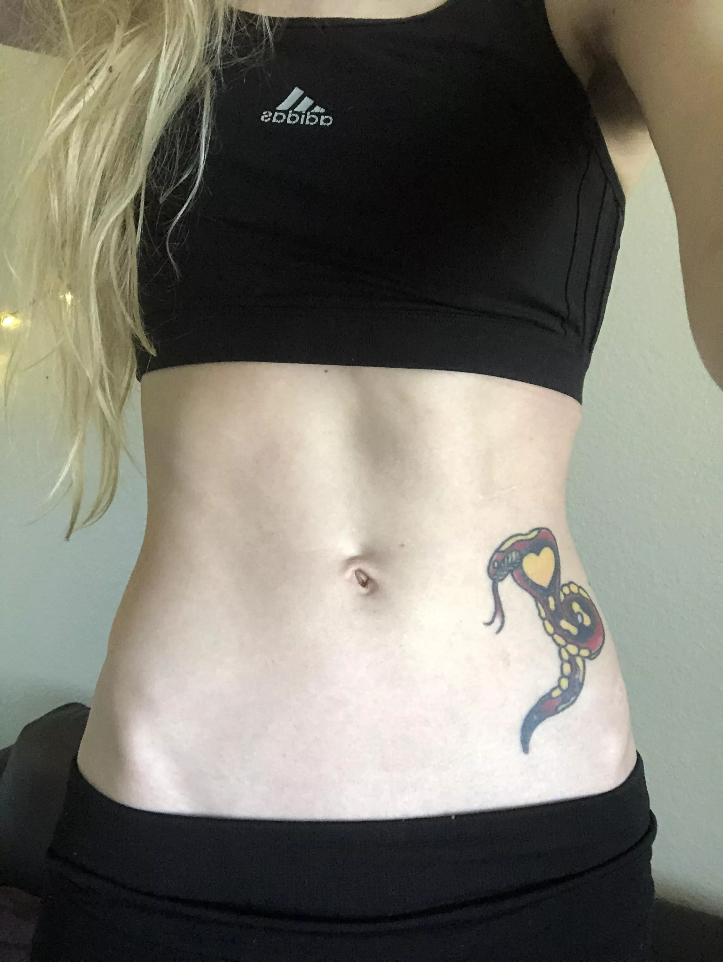 My tattoo is a cobra with a heart of gold sitting right above my hip bone posted by mariawoolf