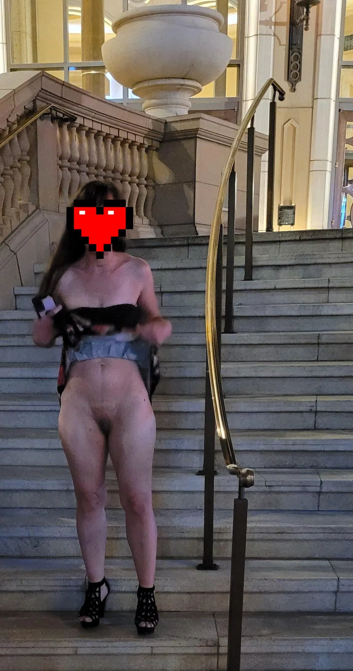 My wife (44) was trying to get some attention in Vegas! What would you do if you saw this walking by? Would you invite her back to your suite? posted by COcouple420