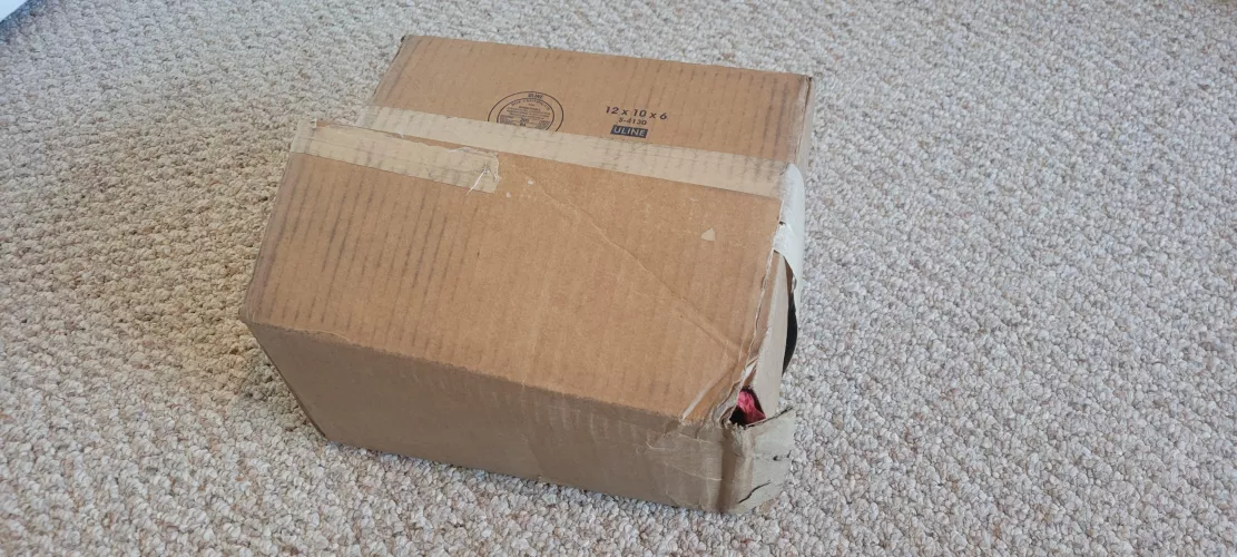 My XL Ika S Flop ordered last Friday arrived today via UPS with the box... half open. I picked it up right after they rang the doorbell. It seems somebody stole the bottle of cum lube. What should I do about this? by Kalekuda