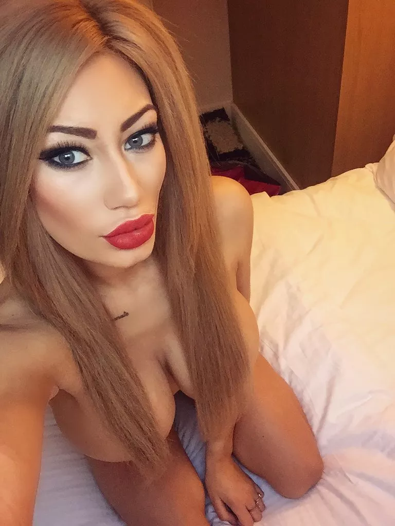 Naked on her knees.. Naughty posted by [deleted]