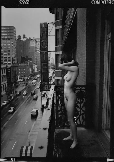 Naked on the balcony at the Chelsea Hotel by saudelobaes