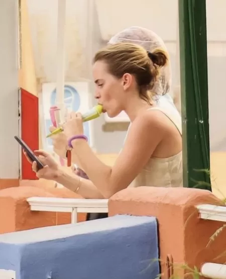 New Emma Watson Paparazzi shot. Interesting… by AllWithinMyHandz