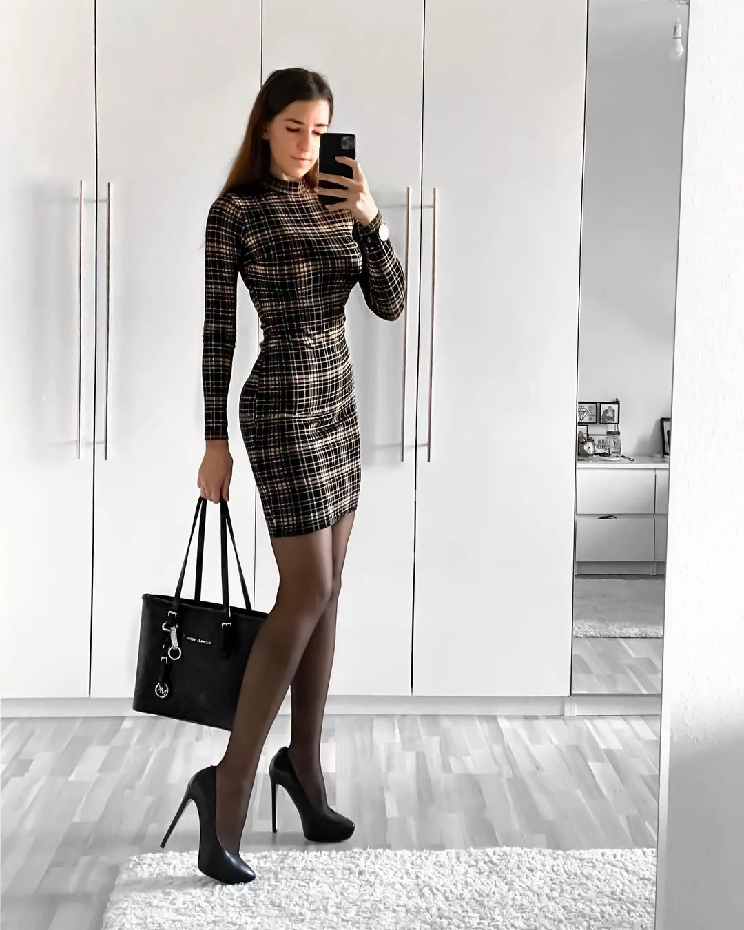 nice dress with classy black heels posted by CautiousSignature586