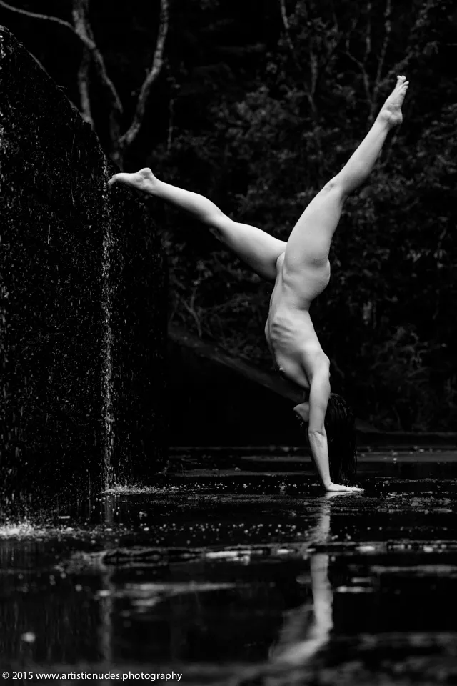 Nicole Vaunt getting into a handstand posted by FirmerDifference