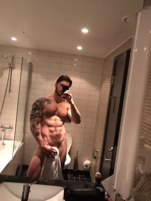 Not quite naked and can’t see the leg tatts but…..enjoy ;P by AndThenIWasADragon