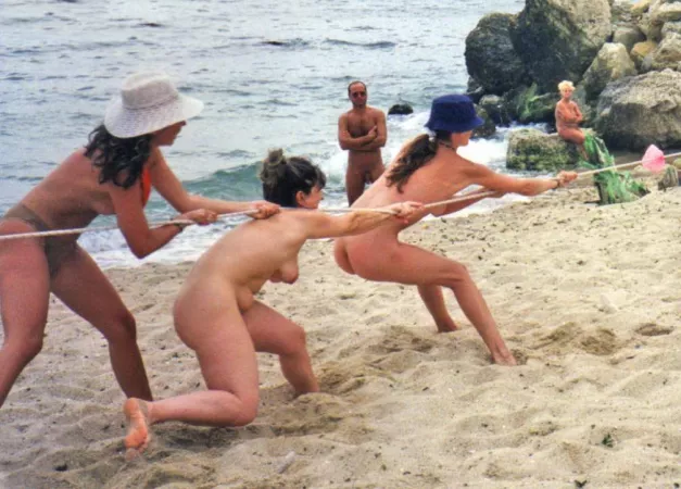 Nude beach olympics (Plage de Lacanau, France) by NaturistPictures