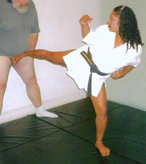 OC A photo from a session I had in 1998. I was lucky enough to find a source for several different women through the famous Asia... good times. Quality is not that great but this woman was a legitimate black belt who trained with Asia and she liked kicki by skipperbob