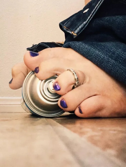 [oc] California painted toes wrapped around Lysol in restroom by JadeAnnByrne