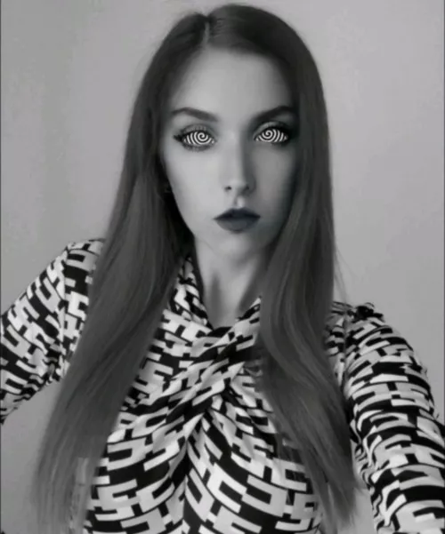 [OC]In an instant her whole world went black and white. The monochrome spiral pulled her in. Her mind followed the black and white lines, stretching thin and ultimately disappearing into the spiral's center. After only a few moments she was your empty t by CrMastermind