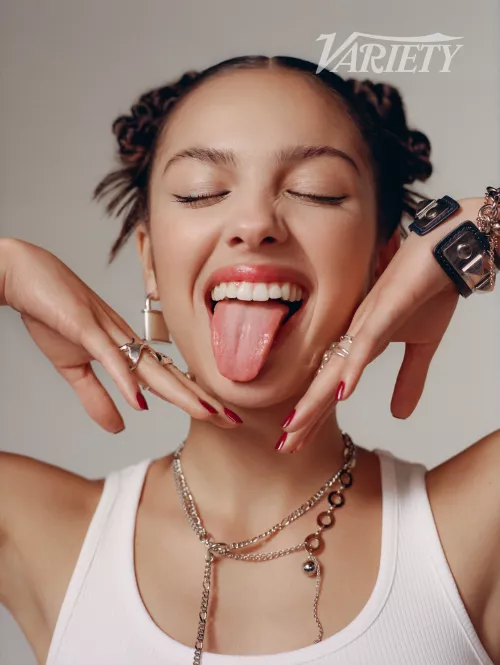 Olivia Rodrigo loves showing off her tongue. by Crazy_Ad_8354