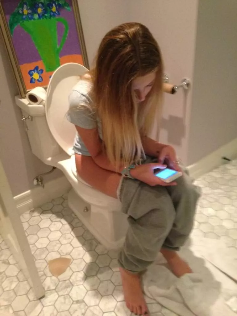 On her phone while going potty posted by CatpainTpyos