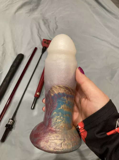One of the Xmas presents my sissy got me is this magnificent giant glow in the dark cock which I intend to use to split him in half (the rest are in the background) by LadyAntea
