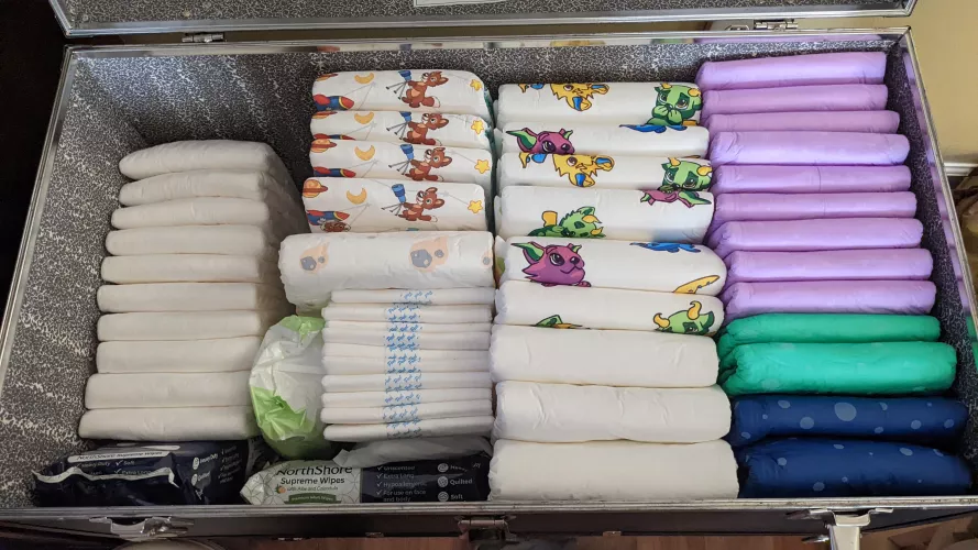 Our little diaper stash...😆 Just enough for the next month or so. Anxious to order more already! ☺️ by KinkySwitchCouple