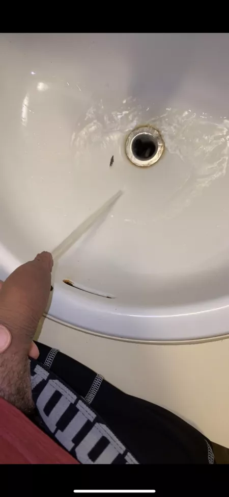 Peeing in the sink by PaganBaby00