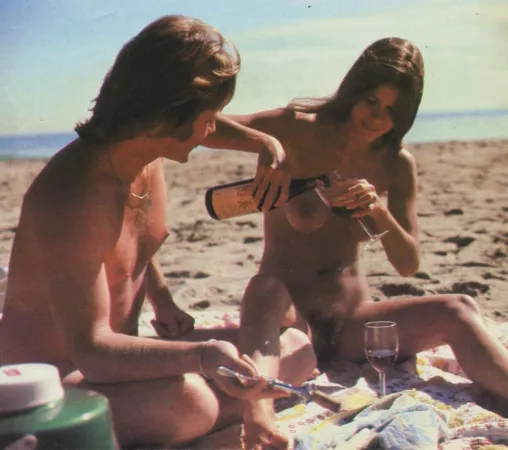 Picnic on the beach with wine (H&E International Summer 1980) by NaturistPictures