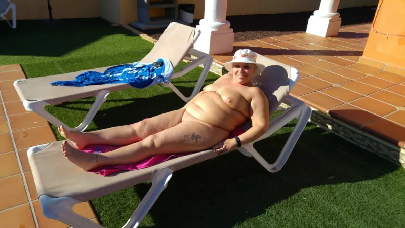 Plump blonde laying out for her all-over tan by Udderluvr2020