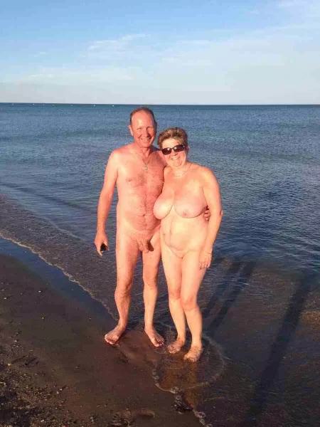 Plump nudist enjoying a sunny beach by Udderluvr2020