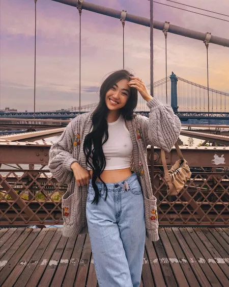 Posing on a bridge by LayDownYourBurdens