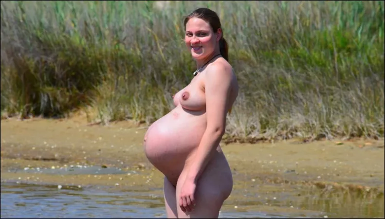 Pregnant nudist at the beach by Udderluvr2020