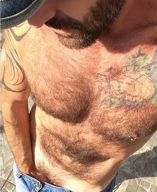 Reaching into his jeans posted by menareamazing