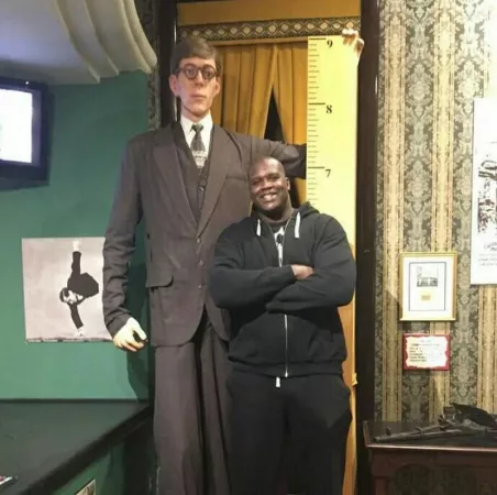 Robert Pershing Wadlow (wax statue), the tallest man ever, next to Shaquille O’niel. by City-Gazer