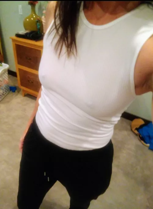 Same hotwife, subtlety different. White tank and no bra is my fave! by midwesthotwifeguy37