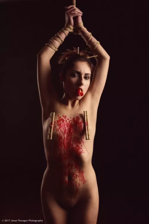 Self waxing while clamped and bound .... I'd say she's pretty busy right now ! by tapednude