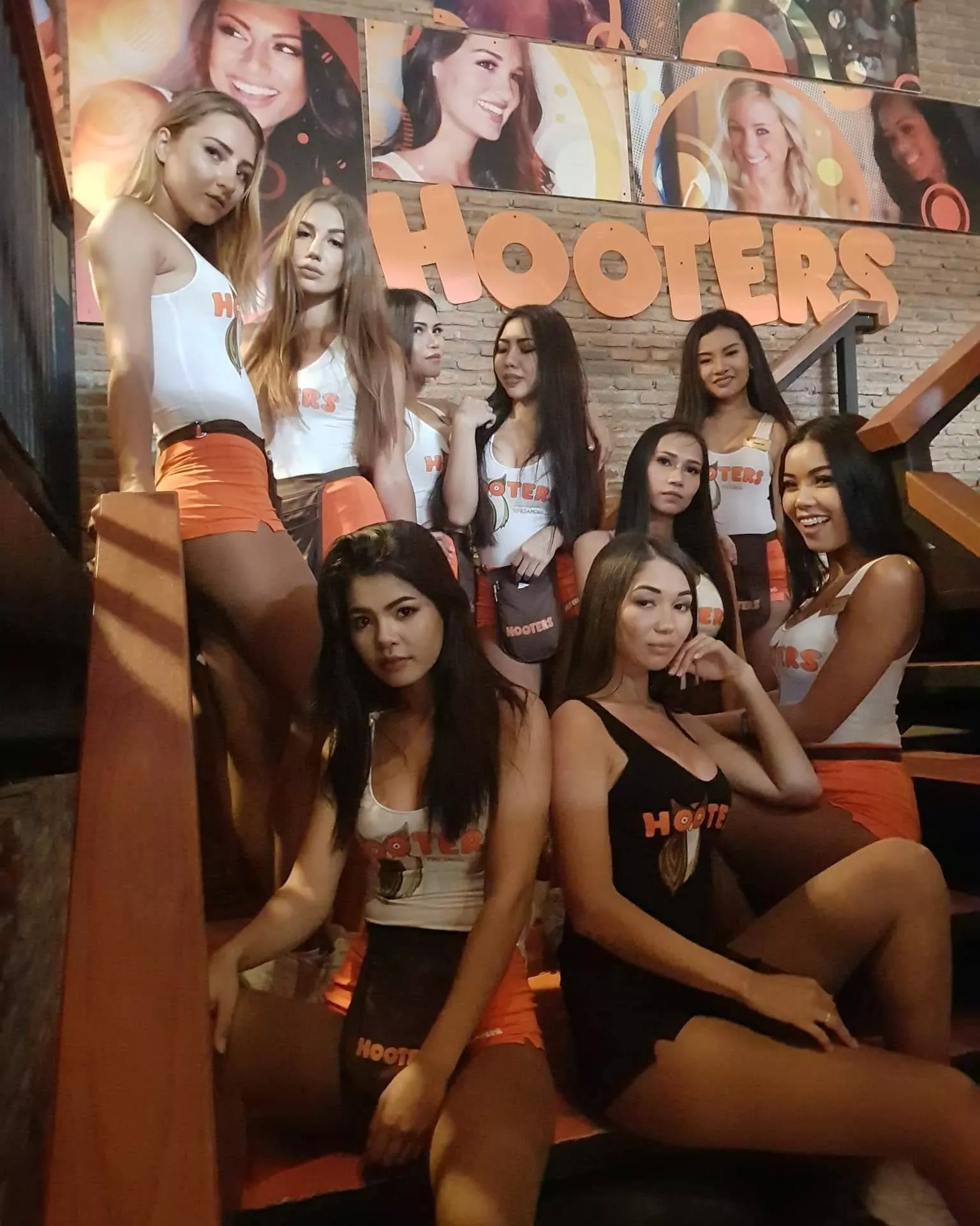 Sexy Thai waitresses inside Hooters in Phuket posted by philippinesaddicts