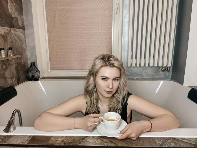 She almost finished her coffee and it's ready to go naked by XLoveCam