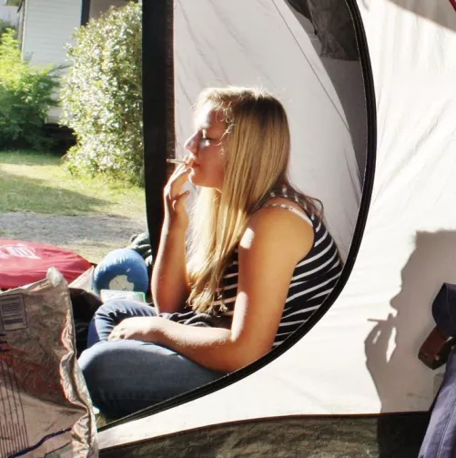 She might look innocent but she lights up many times a day and she enjoys it! by Cleamsi