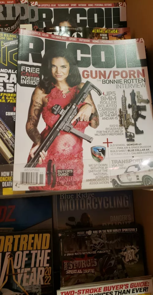 shes in a gun magazine. by playing_ketchup