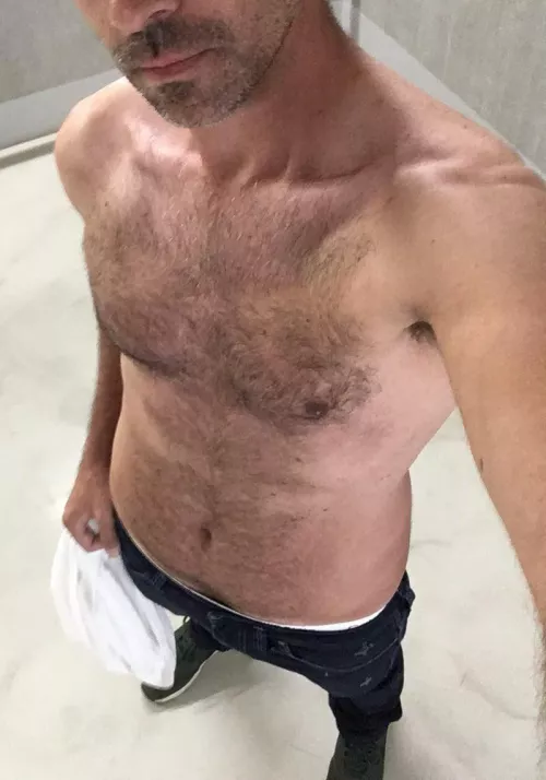 Shirt off in the parking garage by jimmyrazr