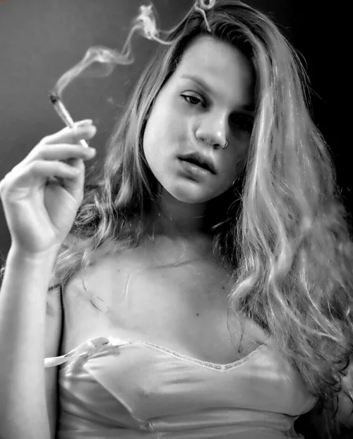 Should I finish this cigarette first? by tjgreen77