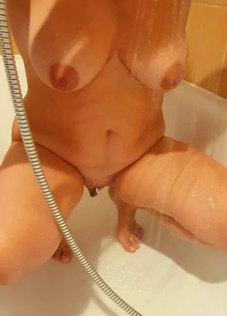 Showering to be clean for tonight's long sex session by MinervaSmallFeetWife