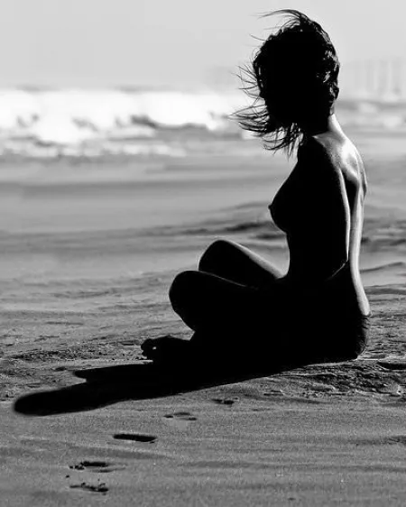 sitting at the beach by xtra-medium