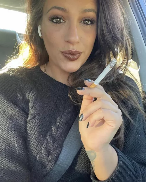 Sneaking one in the car by johnavondale