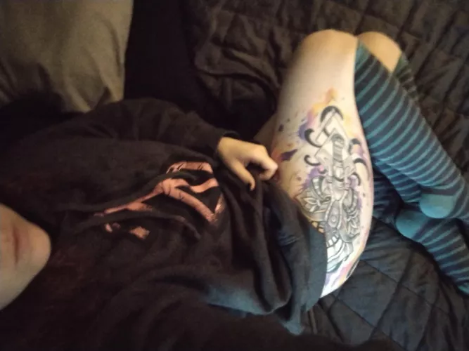 Snuggling in Daddy's sweatshirt while he's away at work. by LeftHandSalt