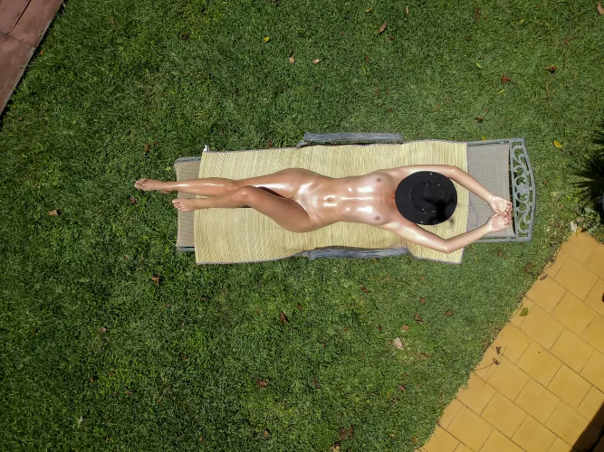 So it looks like my bf was having fun with the drone while I was sunbathing by Kinkypixel