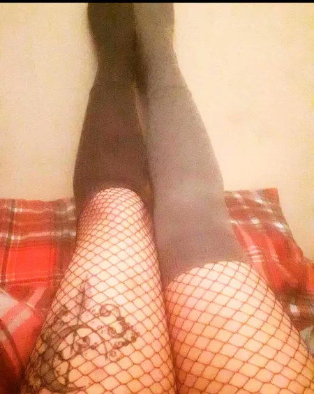 Socky sockys. Is it weird they're different colours and lengths? I think they look cute... Especially with fishnets 🥺 by kittysweetheart