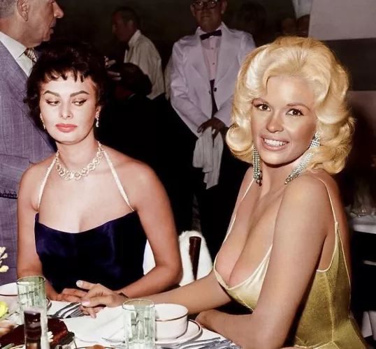 Sophia Loren gives Jayne Mansfield the side-eye. 👀 The photo, taken at a Paramount Pictures party to welcome Loren to Hollywood in 1957, was later colorized. by dr_drippy