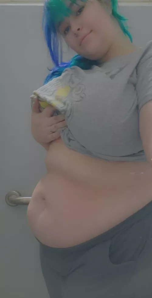 *squish* a lil tummy while at work by big-goth-girl