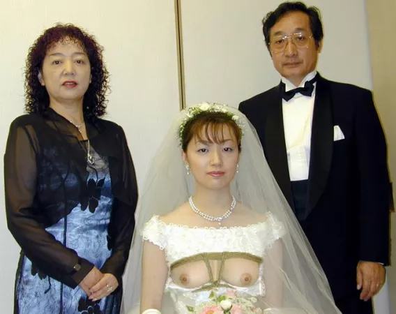 Strange Japanese Topless Wedding photos (see comments for album of 6 pics & info) by bluesmoker
