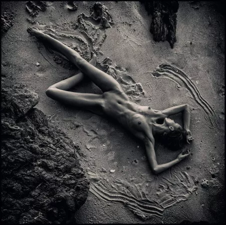 Strewn out on the sand by altbubblr